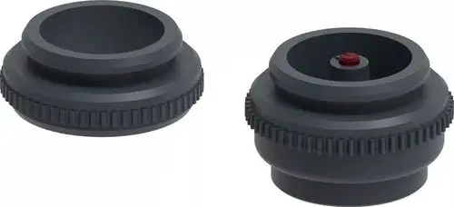 Schwarzer Adapter mit gewelltem Rand und zentralem Ansteckmechanismus. Produkt von Uponor zur Verwendung in verschiedenen Anwendungen.